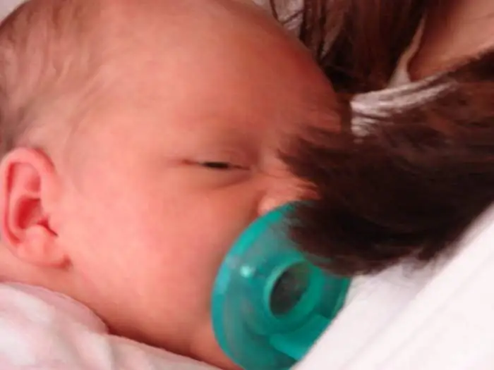 Dani cuddling mommy
