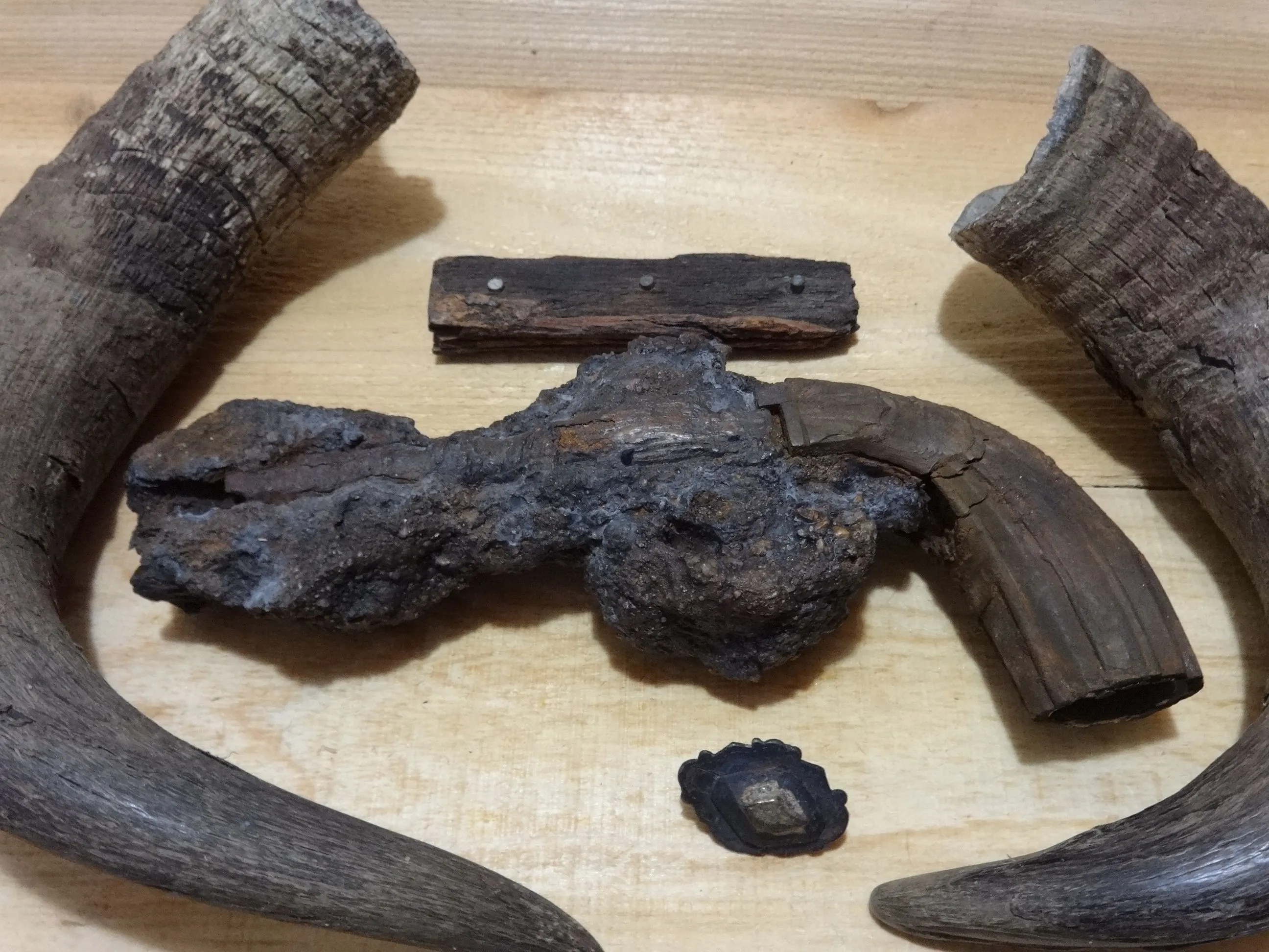 double barrel pistol and three pin skinning knife handle. both found together on a gravel bar in Nebraska.