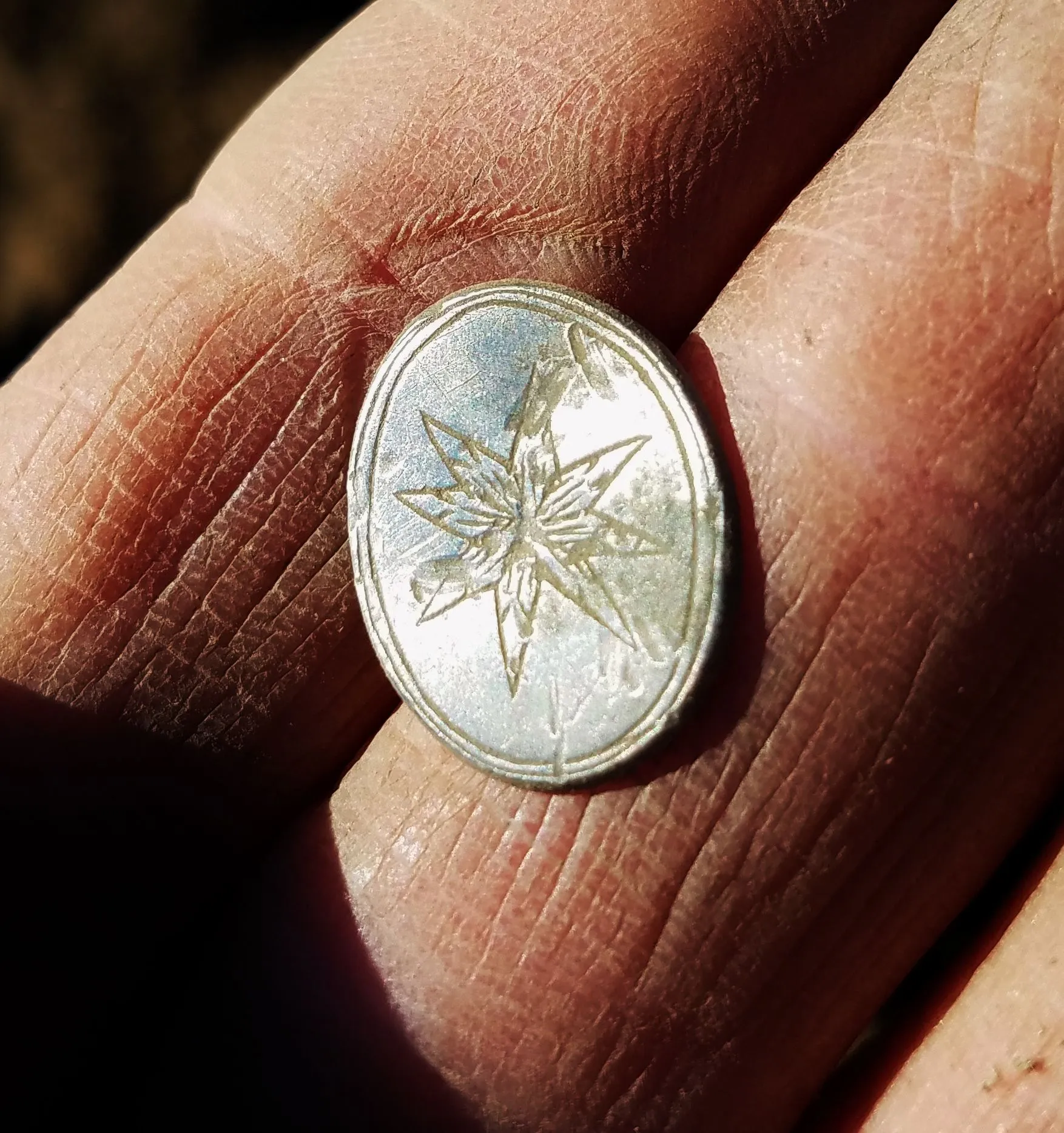 Engraved silver cufflink