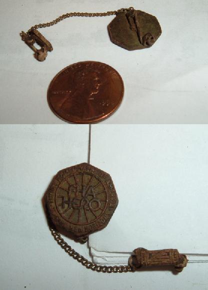 FHA Hero Pin - I found this at the old church I've been hunting. I was amazed that both pieces were still attached by the little chain. The penny in t