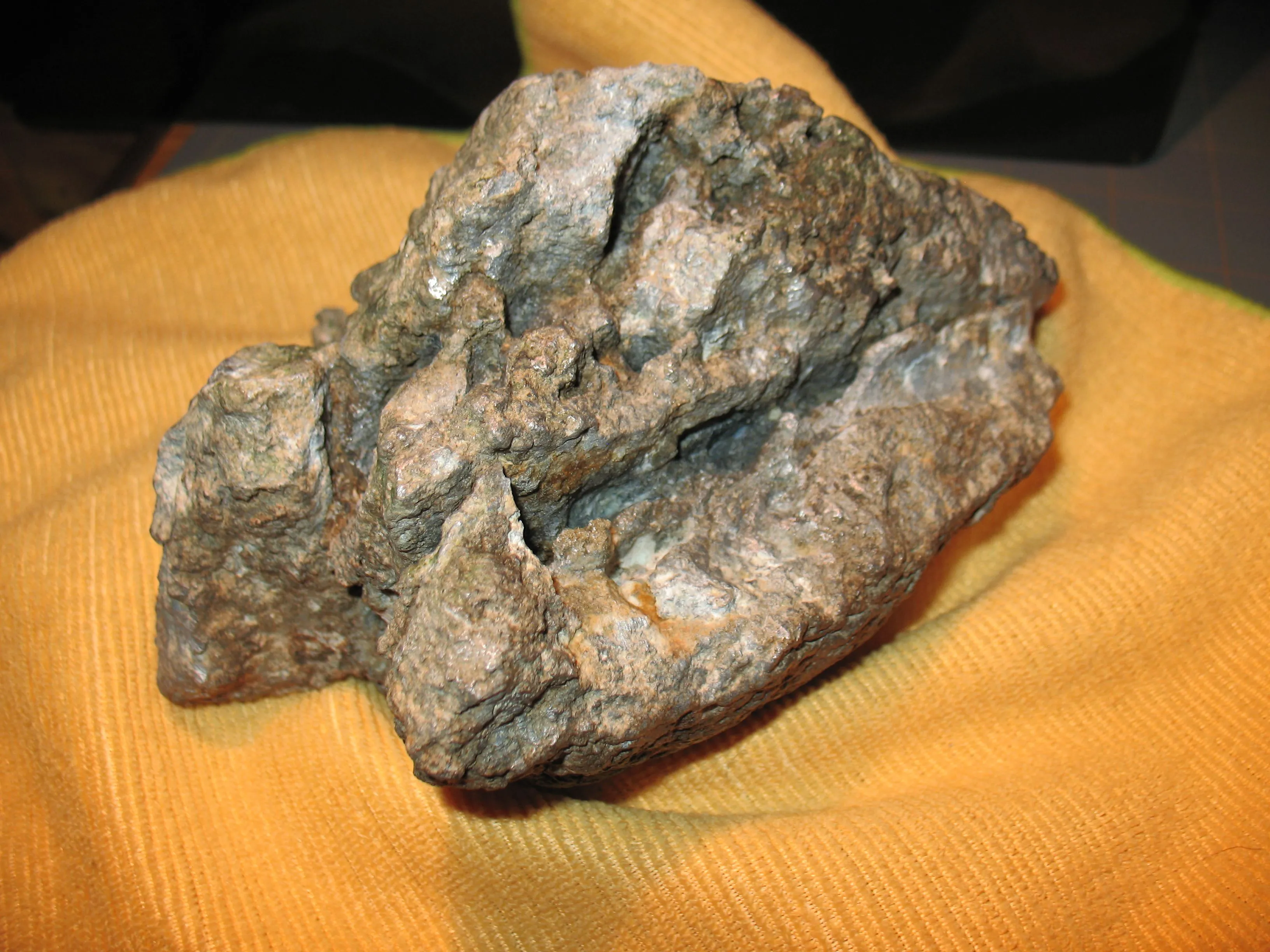 Found this Chunk of solid metal in a nearby river, likely melted aluminum but no foundry's of fire pits around the area. My very first discovery with 
