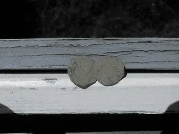 Front of cufflink-shamrock designs on each piec