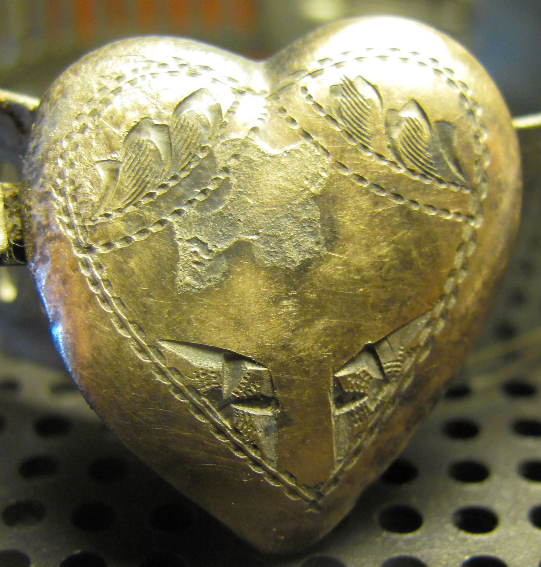 Front to a heart locket. 12k gold filled on sterling silver. 11/2012