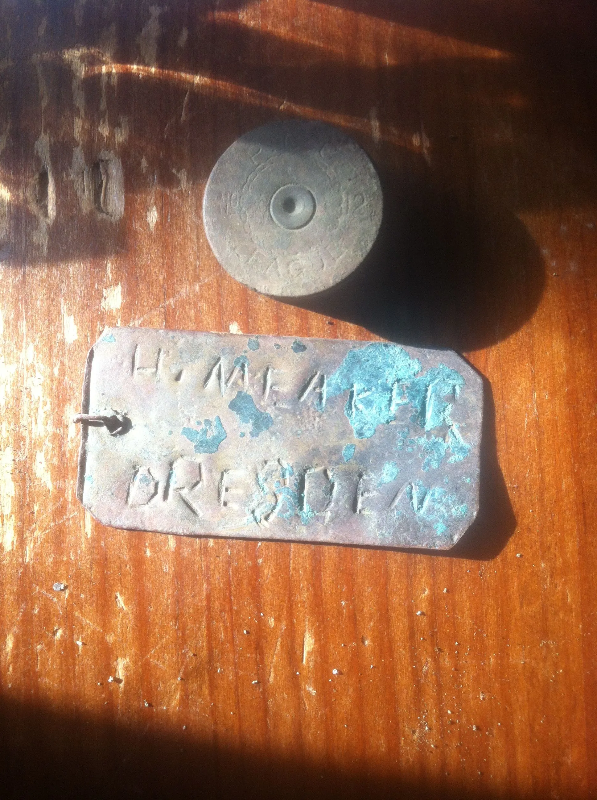 "H. Meaker Dresden" old trap tag.

Tag of some sort for a local resident. Looks hand stamped, copper maybe. Twisted wire held it to whatever was attac