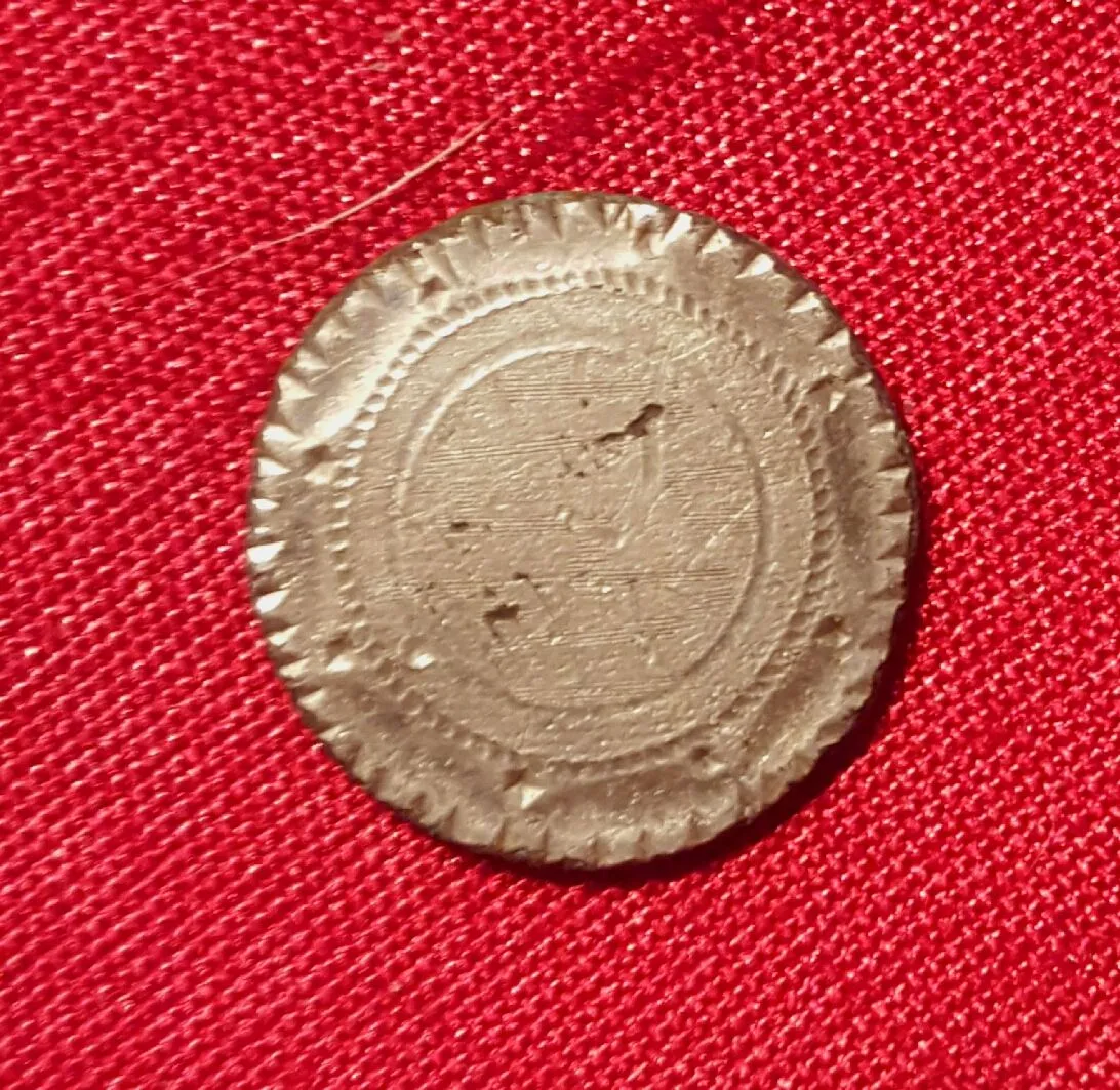 Hand-etched small button