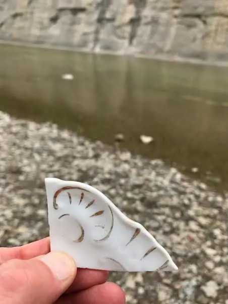 Hand painted plate plate edge found on the Chagrin river in northeast Ohio.
