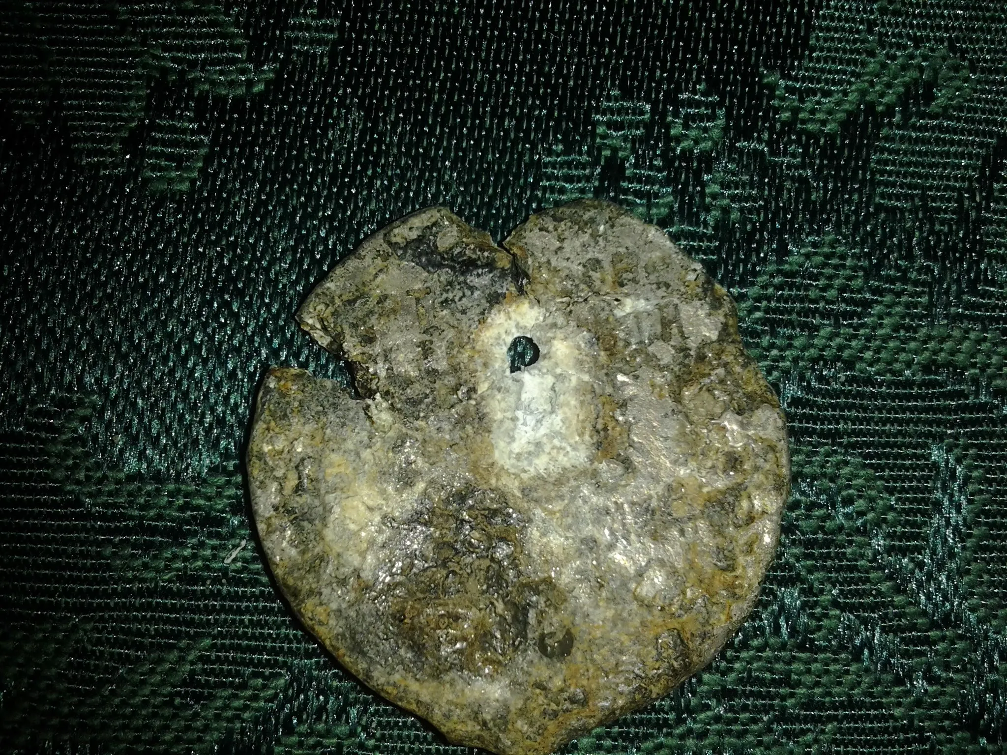 Has a hole at top middle