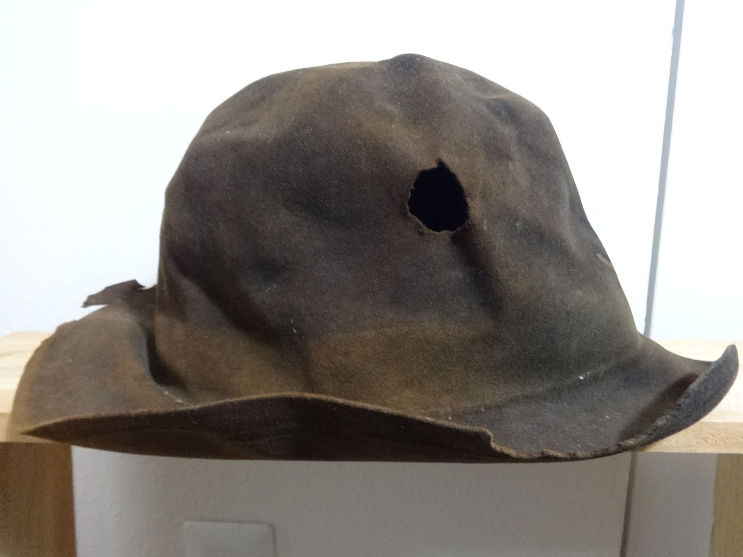 hat with hole, 1890's Leadville privy