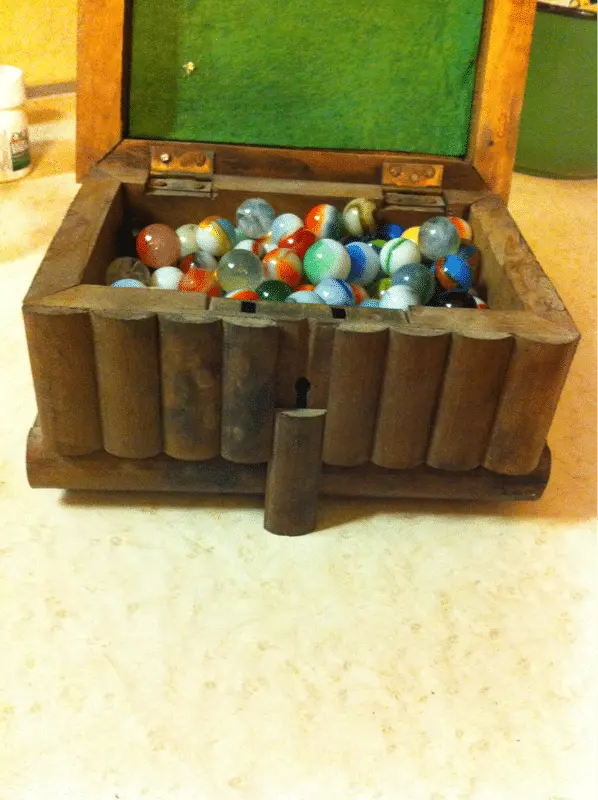 I believe this is also a Tramp Art type of box. It even has a puzzle kind of lock.