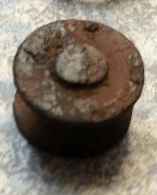 I've thought sword clasp, ear plug, overall button. Markings but can't distinguish. Cherokee Co. Rivet for all I know. Dig and research later. But sam