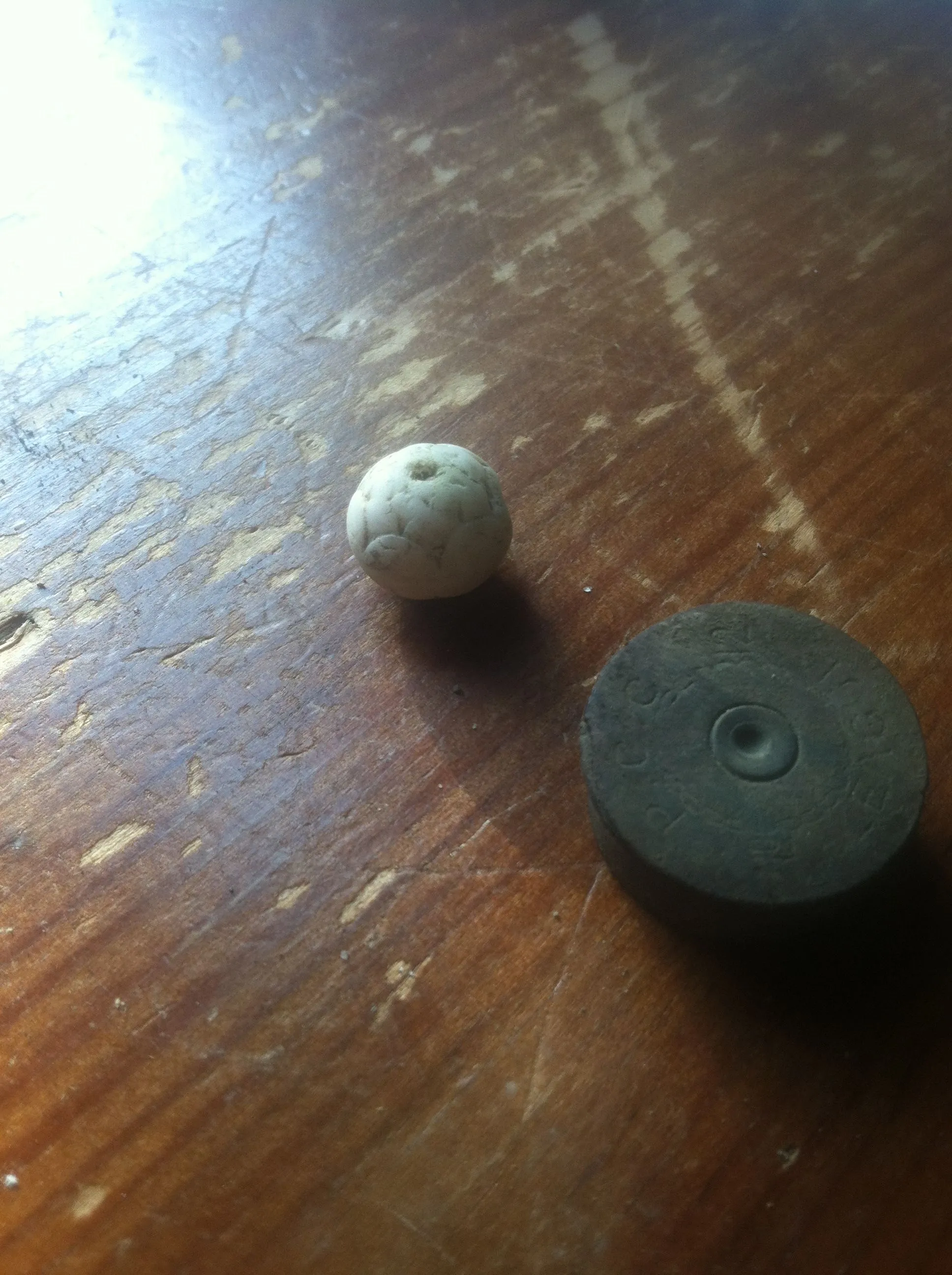 Jewelry bead. Eyeballed this little creep on the creek bed one calm and sunny day, about a foot under water.  I bent over and plucked it from nature. 