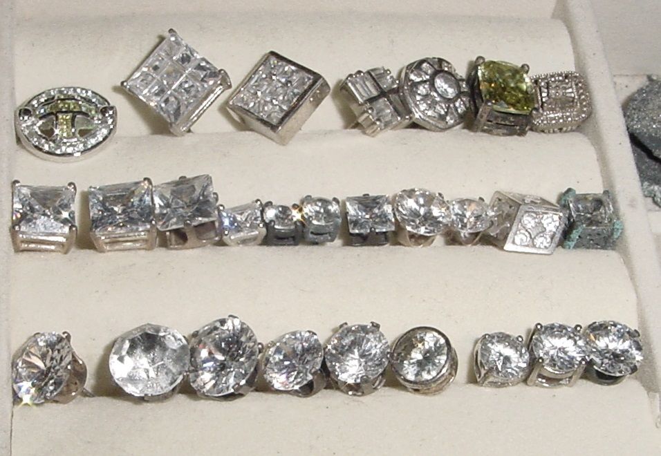 JUST SOME OF THE STUD EARINGS IVE GOTTEN OVER THE YEARS - IVE GOTTEN MANY AT CLEANED OUT SPOTS - I WILL GET HIT THAT IS SMALL BUT HIGH PITCH ON THE CZ