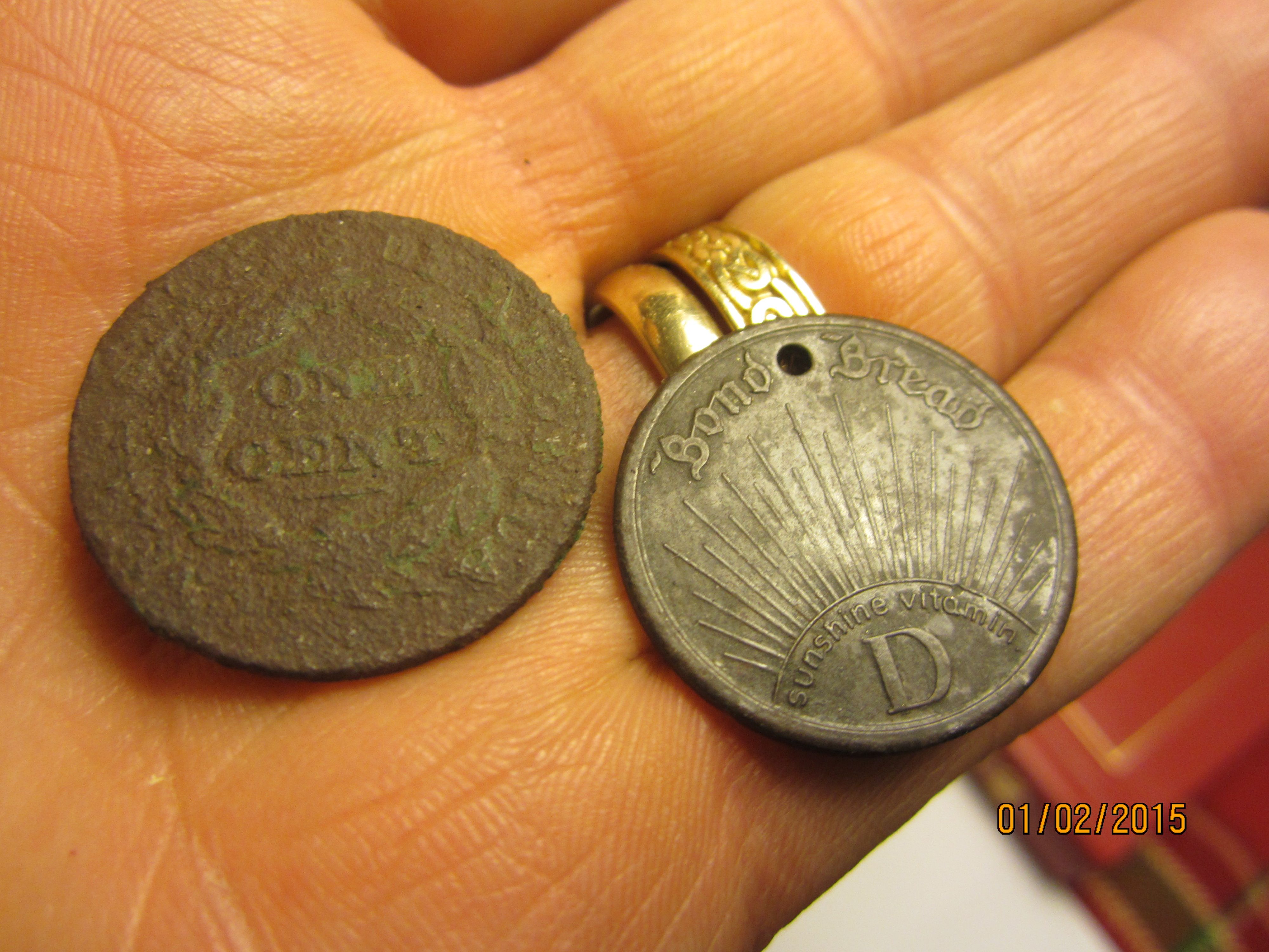 Large cent and Bond Bread token