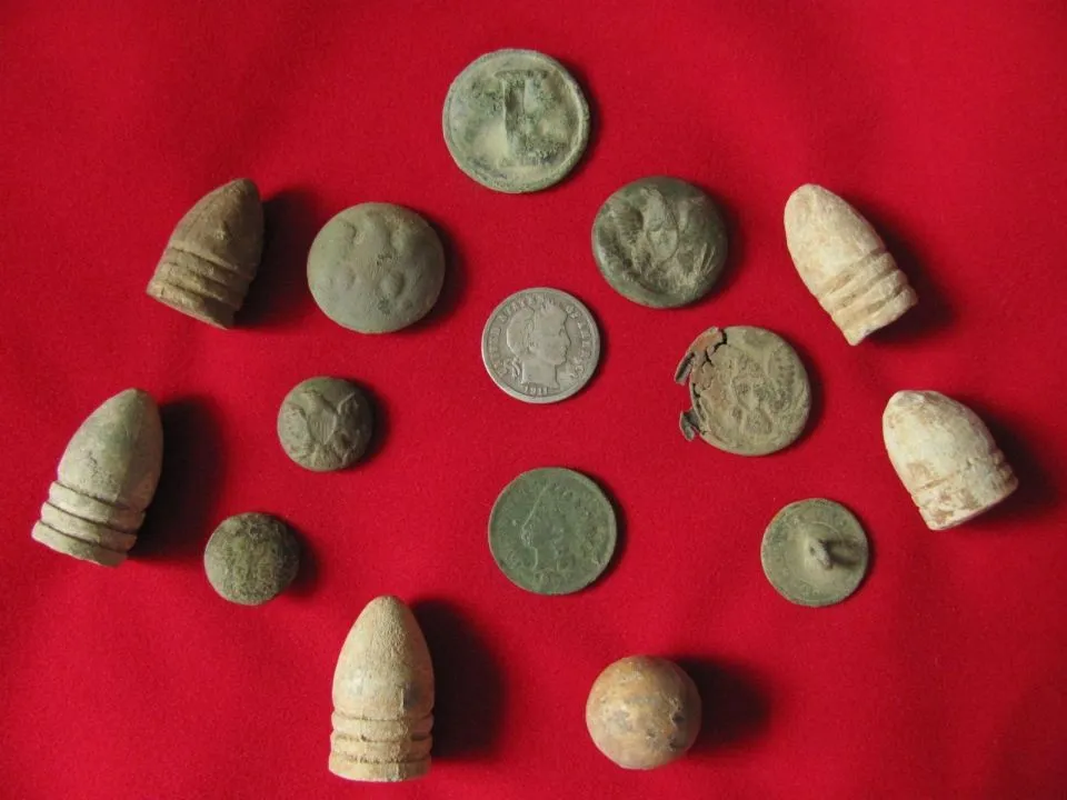 Lined "I" and Eagles - Photo of Buttons before cleaning from April 23rd, 2011 Dig