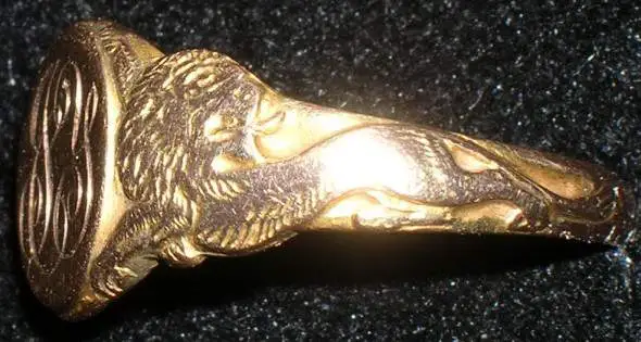 Lion Ring - This 10k initial ring has a full body lion on both sides.