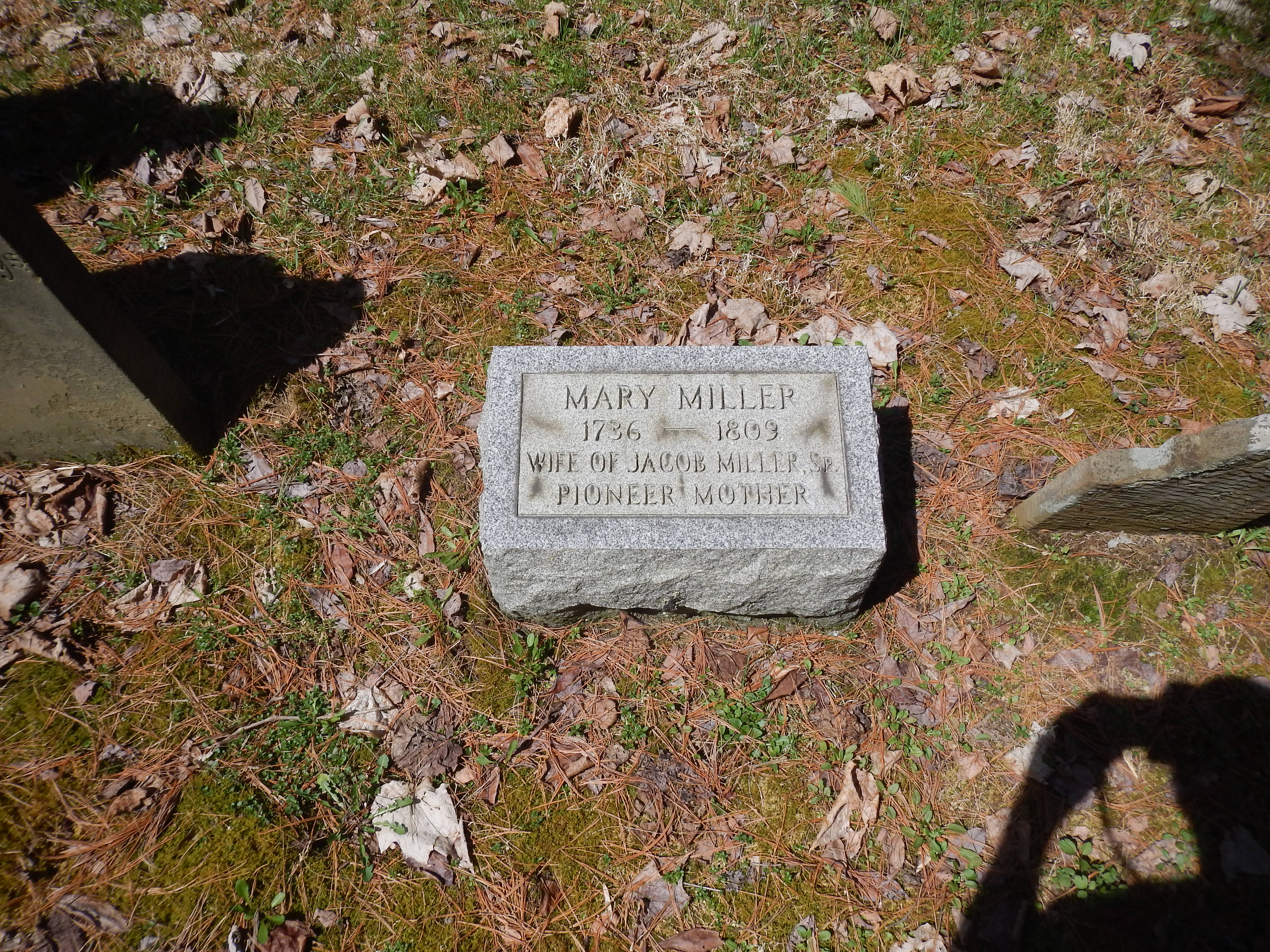 Mary Miller, wife of Frederick Miller. New stone next to original sandstone head stone. Original headstone is broken.