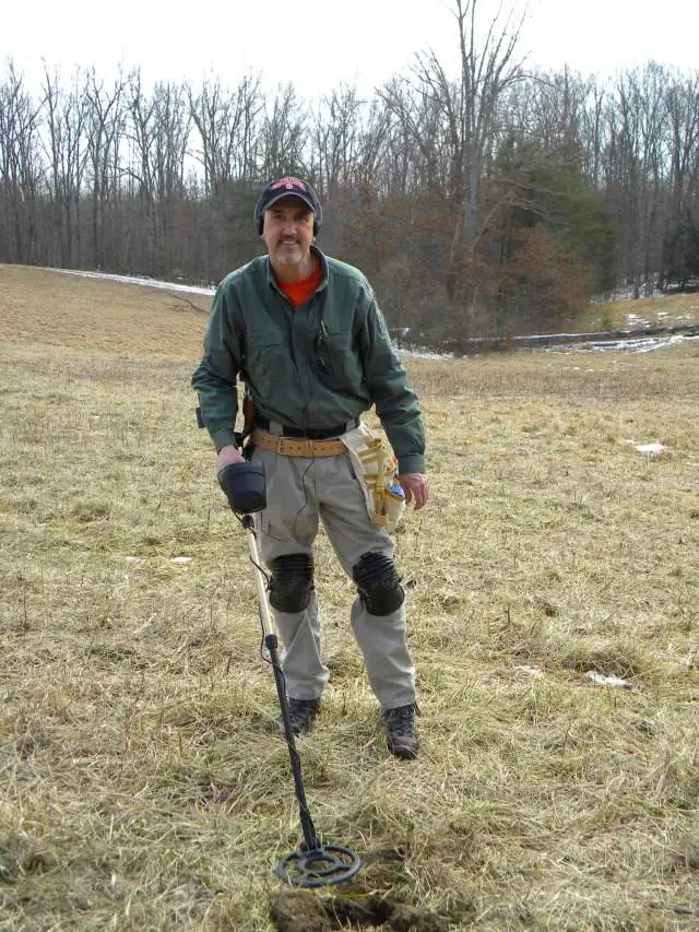 Me - Digging a little dirt on an old home-site in Morgan County, KY.  Feb. 2010.