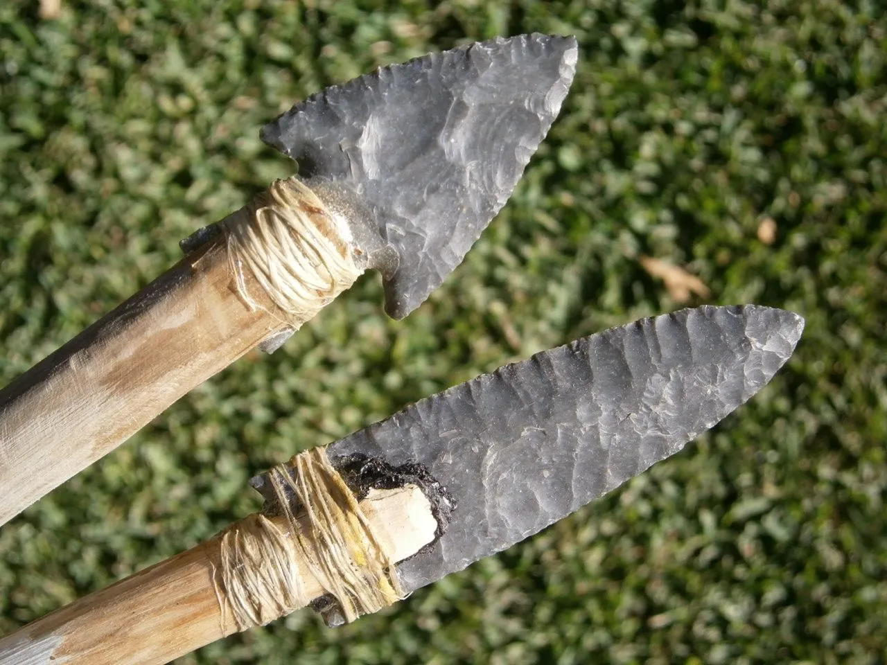 modern knapped by a buddy and hafted by me for use on the atlatl dart shaft tips