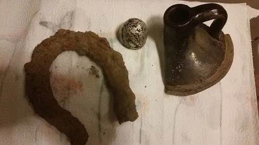 My first horseshoe yay!A salt shaker top, piece of a whiskey jug.