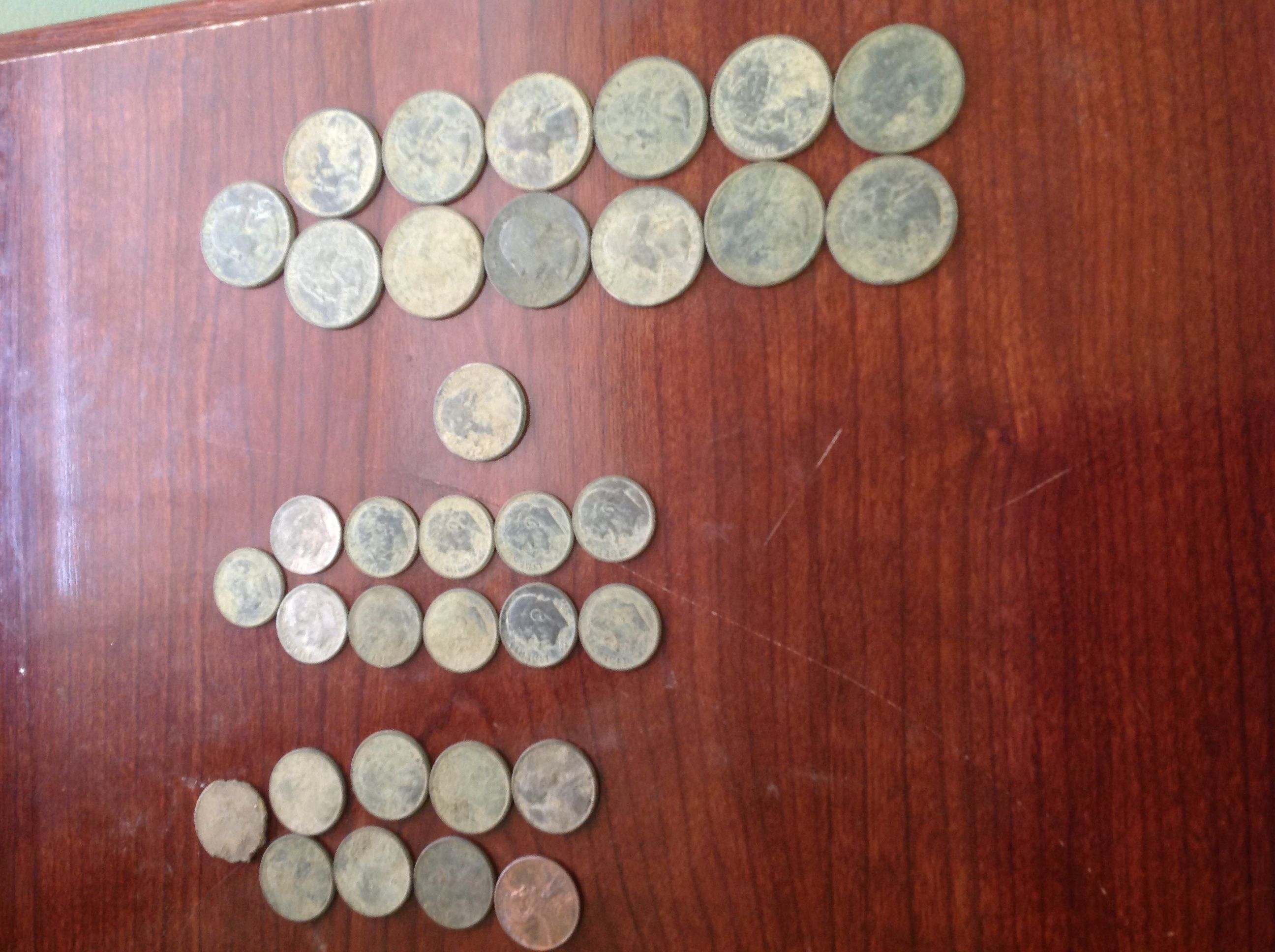 My second day with the Garrett Ace 350 13 quarters, 11 dimes, 1 nickel, 9 pennies no silver but I did get a wheat cent