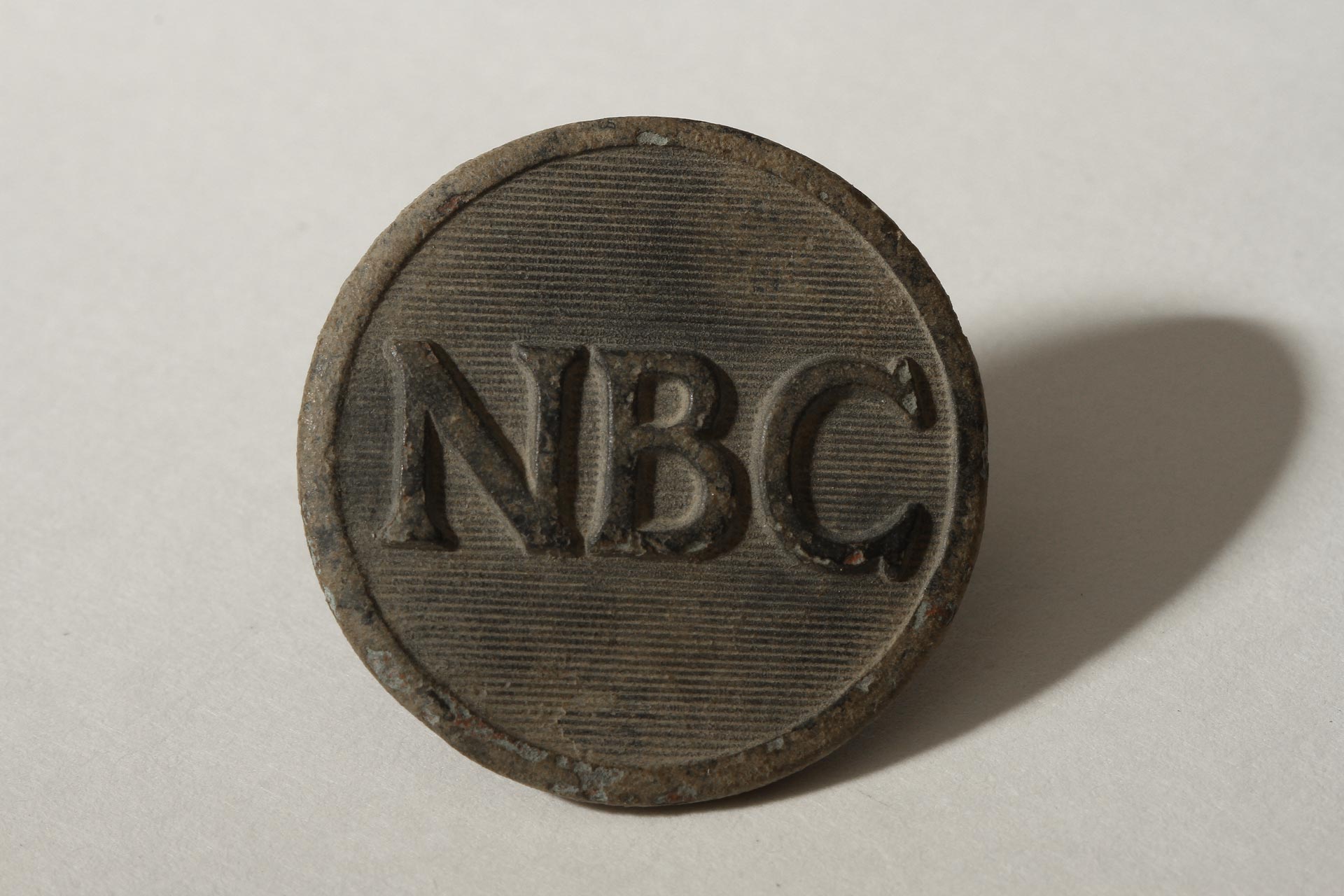 NBC Button front