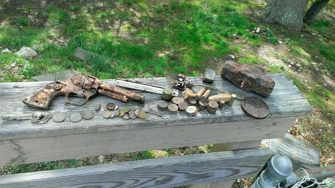 next to yard finds 5/17/14 Hubley Texan Jr 50's, mini hubley 60's, Boar's Head 5" pocket knife, Silver plated spoon, lots of lead, lots of clad, 10 pa