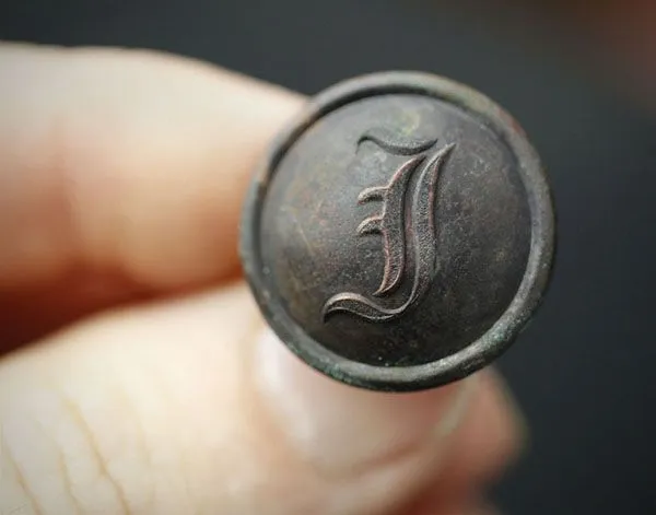 Nice Script I coat button from a construction site.