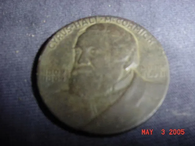 Obverse of 1931 Token from the International Harvester Company celebrating the centennial of the McCormick Reaper