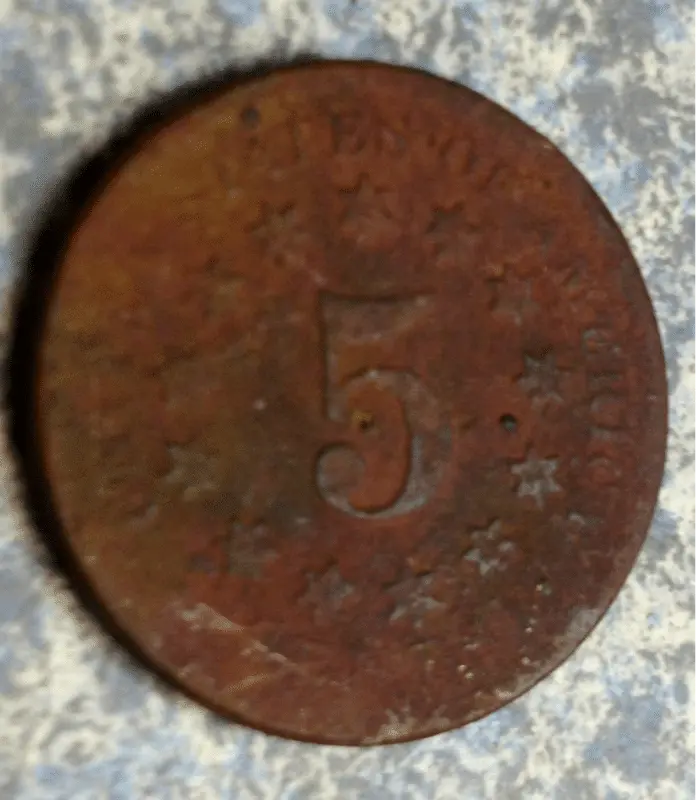 Of three shields...only one kept one side of its face. Happy nevertheless. Always happy to dig  anything 1800's...