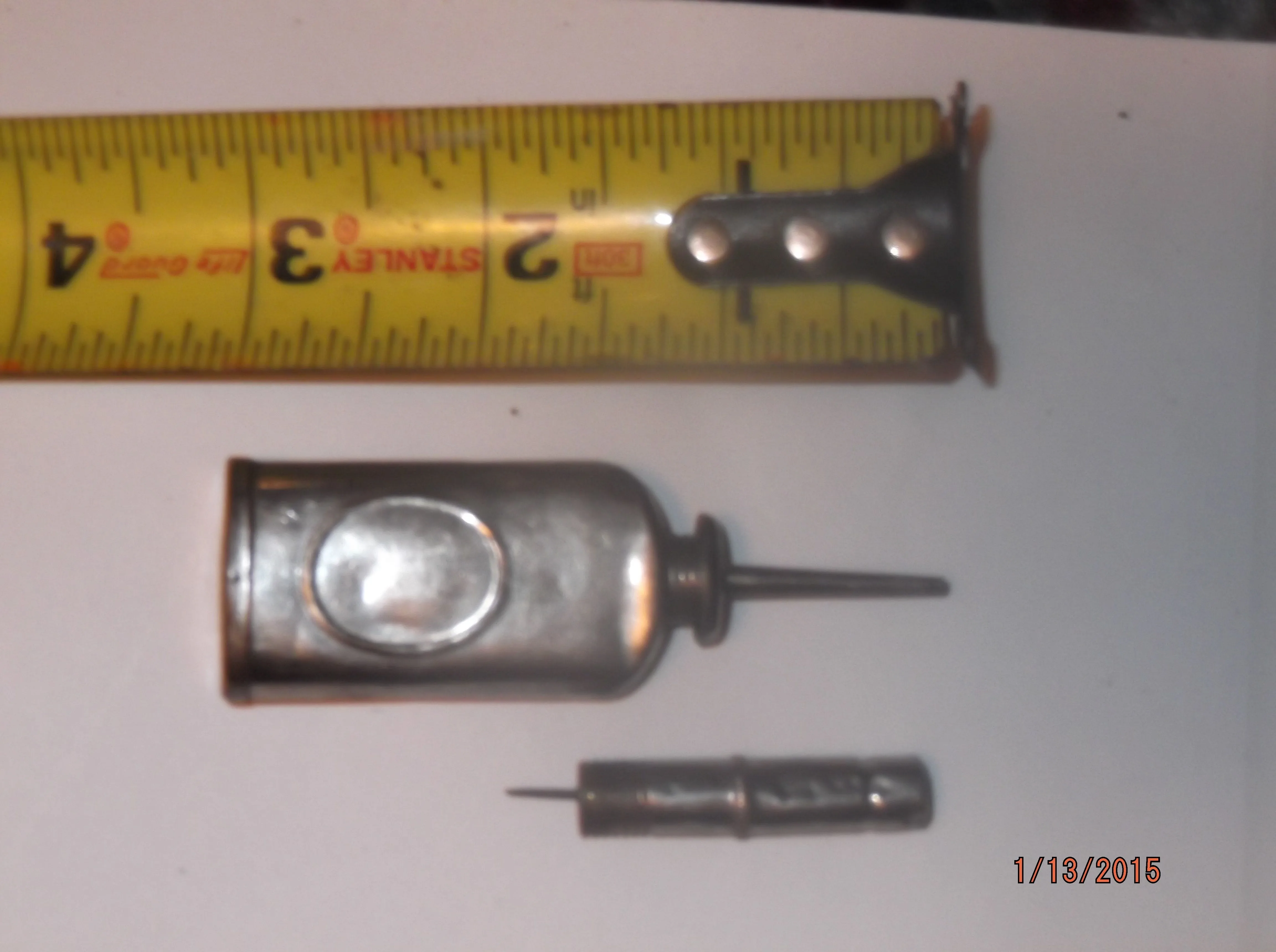 Oil dropper for old sewing machine.