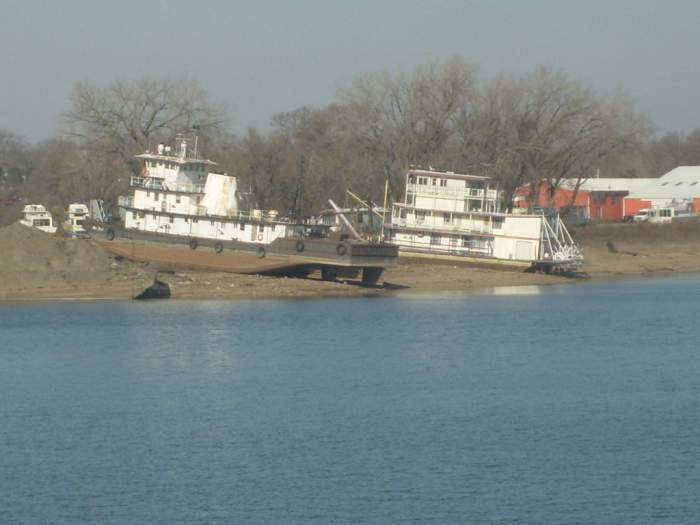 old boats - Here are a couple of old boats on the bank above Peoria lake on the Illinois river.