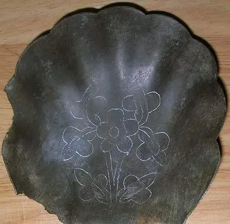 Old Salt Dish - I dug this brass salt dish at an old house site. I rubbed powder in it so you can see the design of flowers.