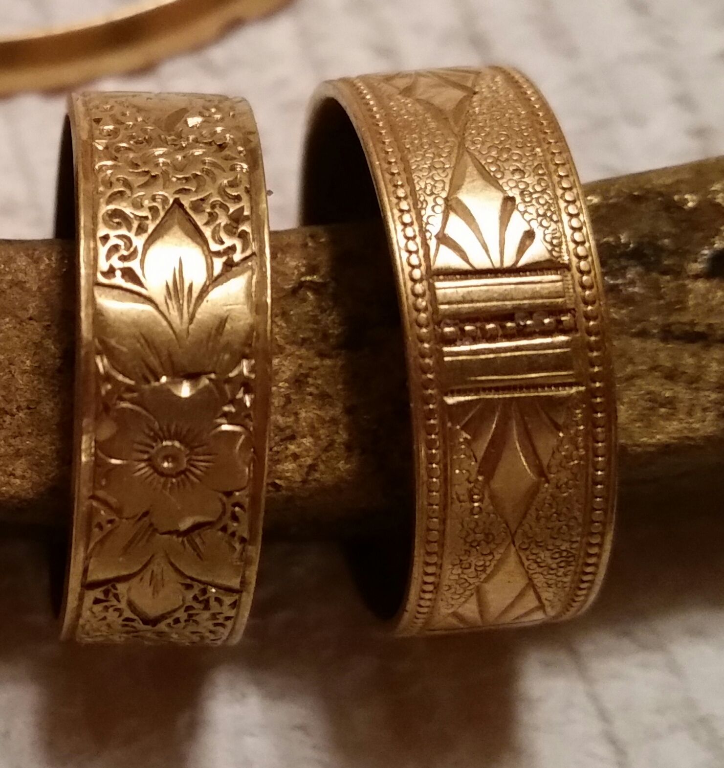 One dive two 1800's gold rings and bronze or brass ship spike