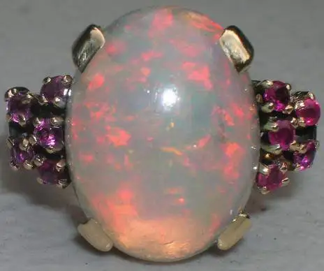 Opal Ring - This is a 14k opal ring with rubys.