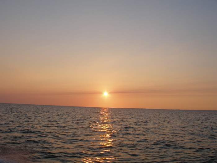 Out on the water and enjoying the sunset....... -     Some of the classic sunsets on the Great Lakes.......