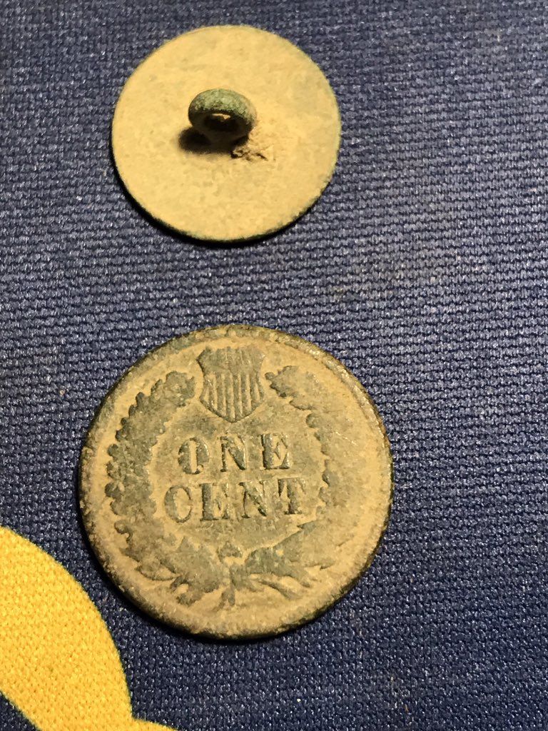 Rear of flat button and 1901 Indian Head Penny