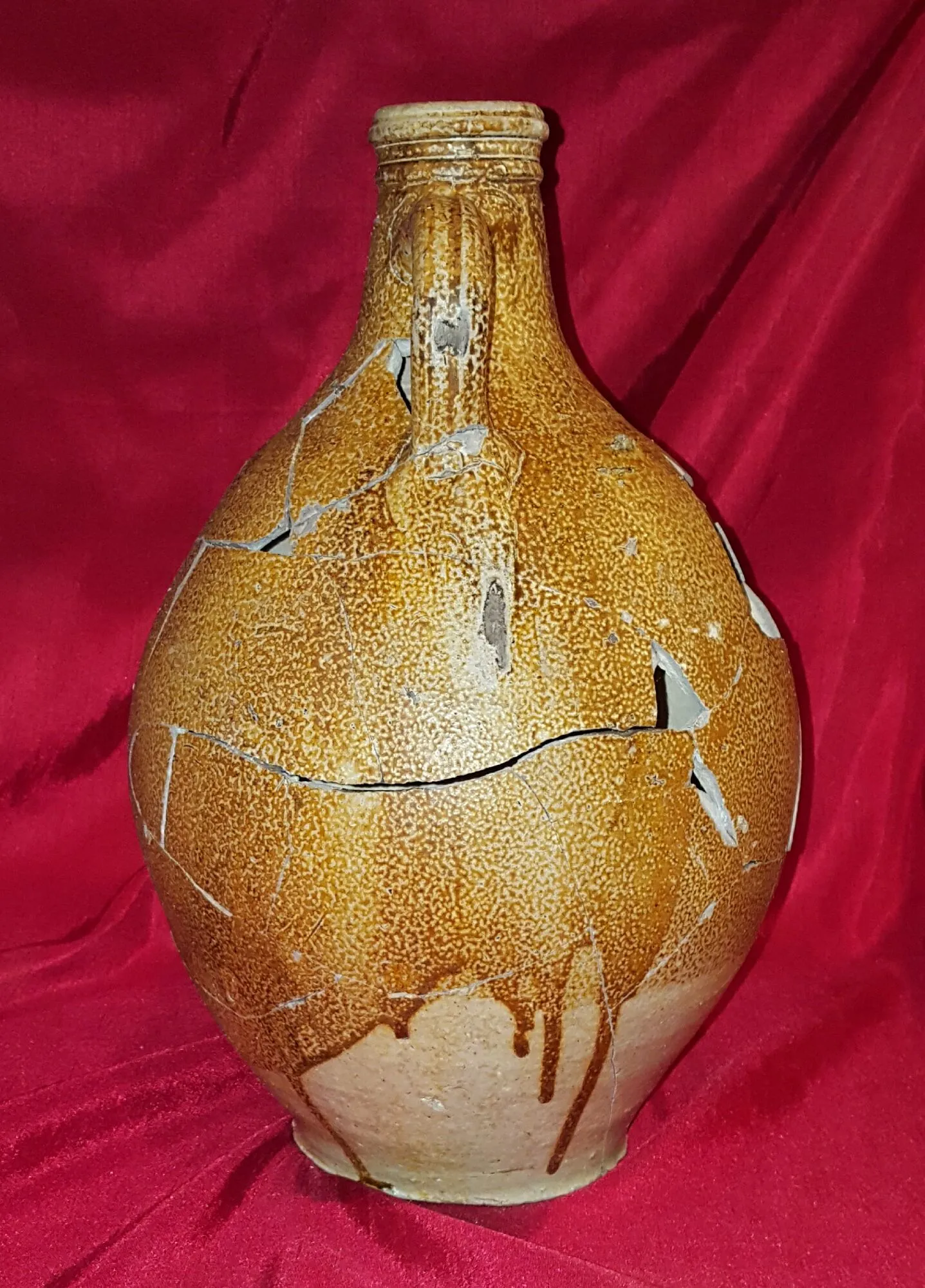 Reconstructed 17th century Bellarmine (aka Bartmann) jug. Shards dug from the "Swamp Pit"