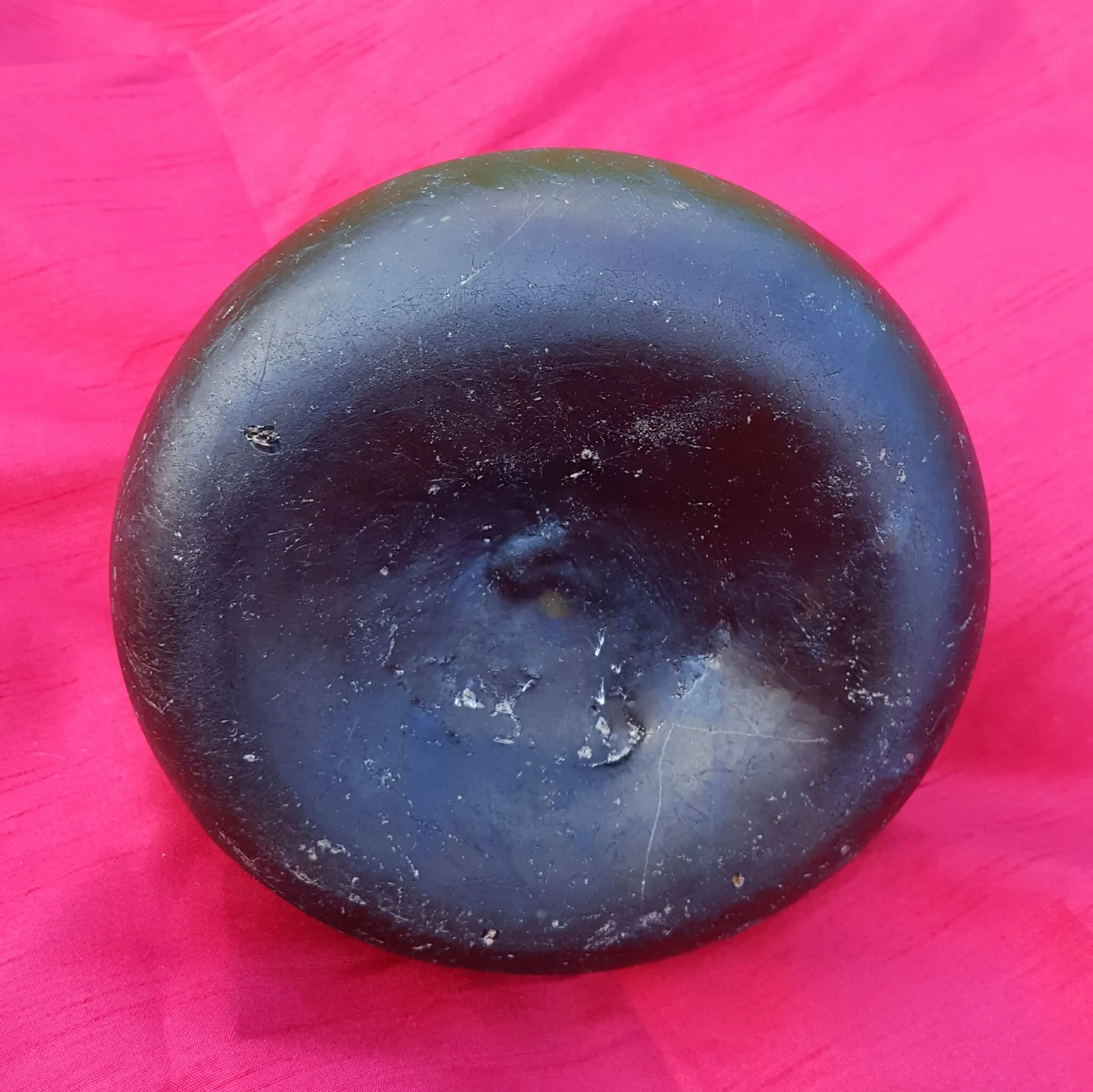 Reconstructed early 1700s black glass "onion" bottle