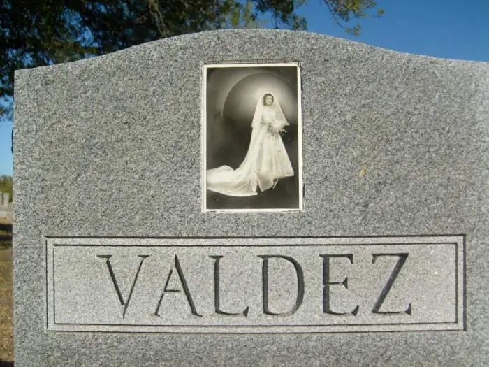 Remembered young - this lady is no relation,i just found this headstone very interesting. ive never seen one with a wedding photo like this before. th
