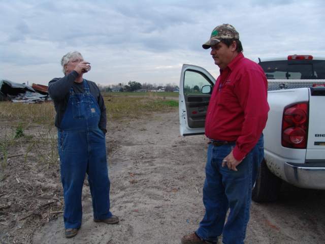 RickyP explaining to Cajunme the finer details of cooking clay pigeon found during a hunt !