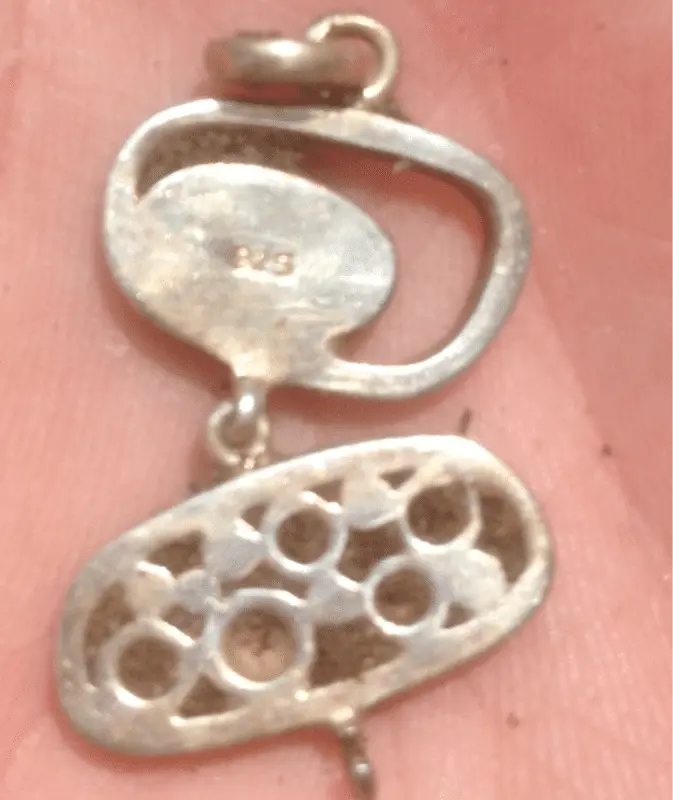 Silver (bracelet part) marked 925. 1st silver jewelry ever found.