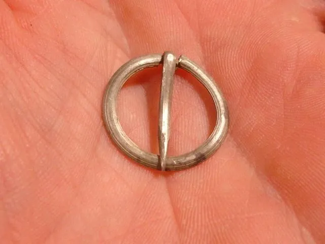 silver broach