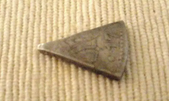 Silver Piece of Eight -           While scouting for a CW site for Dman and I to hunt, I found this piece of a 177? Eight Reales near a spring close t