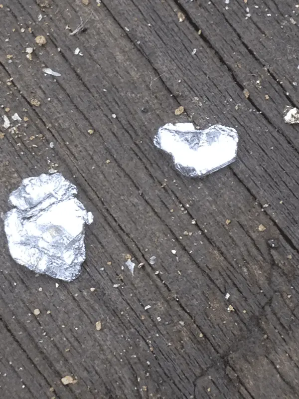 Silver? Platinum? White gold? It doesnt melt below 600' so not galeena..