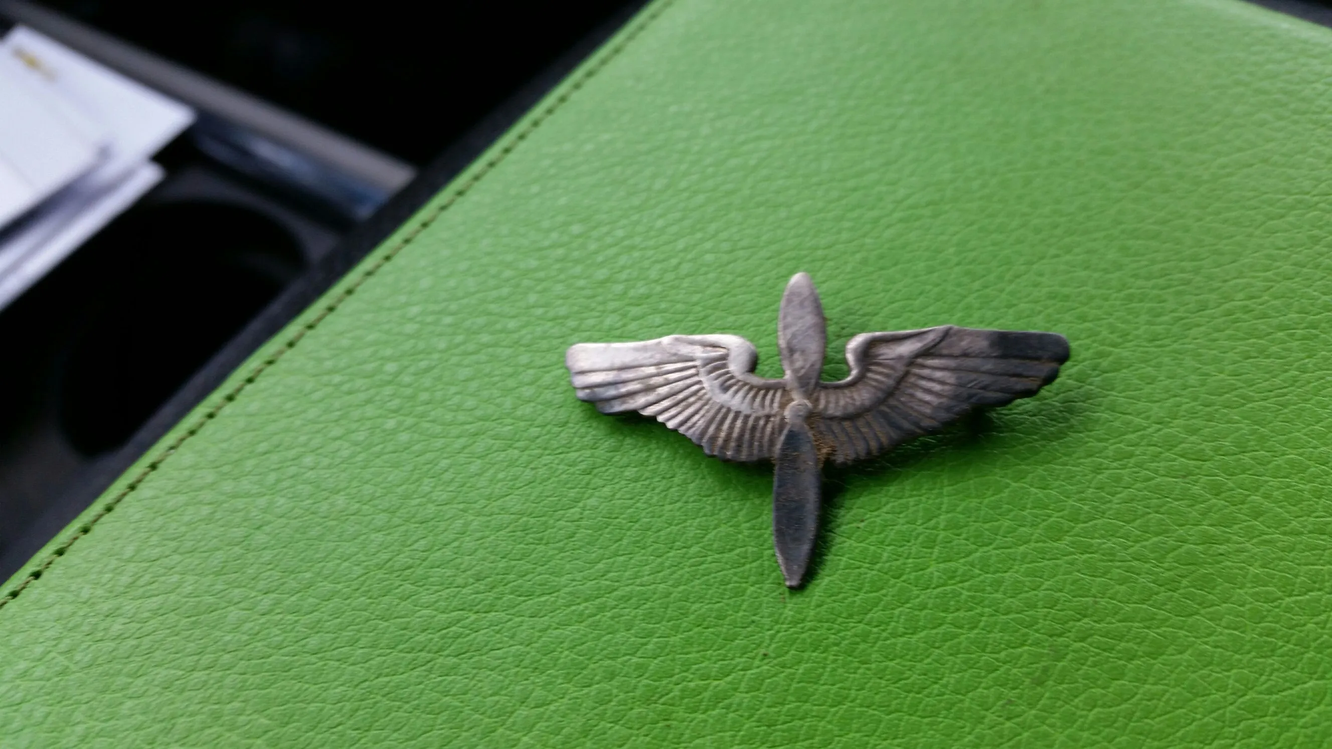 Silver WWII Aviators pin. Found in yard of 1906 house.