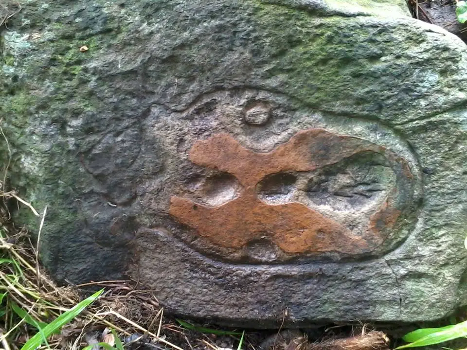 site 1 marker: i found this sign in a rocky cost line ..... a 3 stones form like a triangle 1 foot above the ground ,,, one of the stone with marker f