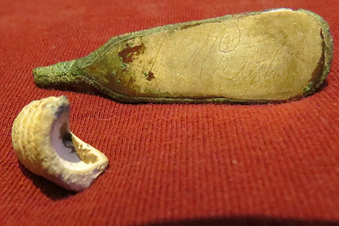 Soldier "J. Wright" and his carved bullet. Found in a Confederate picket camp.