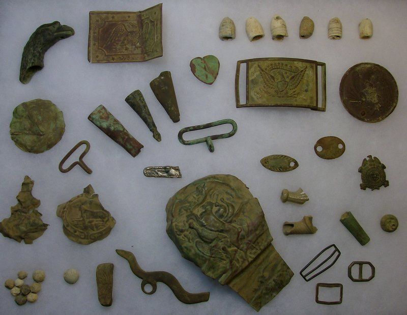Some of My 2008 Finds - Militia Plates, Scabbard Tips, Powder Flasks and More.  Here's the link to our 2008 Annual Post:

http://forum.treasurenet.com
