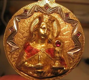 St Barbara  14K with 6 rubies

30.6 Grams