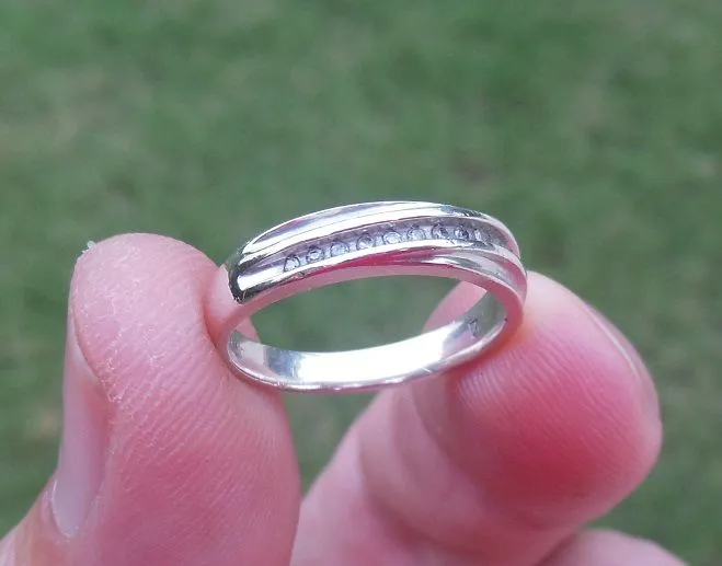 Sterling wedding band....real diamonds